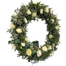 Load image into Gallery viewer, Floral wreath with white flowers and green leaves on a white background