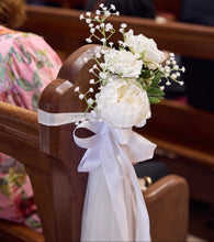 Load image into Gallery viewer, White wedding ceremony chair flowers and church pew decorations with premium tulle at St Paul's Catholic Church, Urrbrae, Adelaide.
