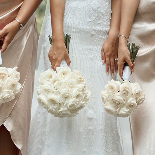 Classic White Ecuador Rose Bridal Bouquet by Floral Atelier Australia – 45 roses in a full, rounded hand-tied design.
