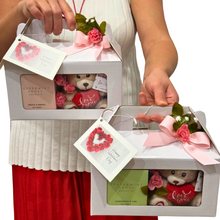 Load image into Gallery viewer, Close-up of the Gift One with a soft mini teddy bear and a Peppermint Grove Australia mini soy candle, elegantly presented in a white gift box decorated with pink silk flowers and a &#39;Happy Valentine’s Day&#39; card
