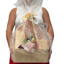 Load image into Gallery viewer, Elegant gift hamper featuring premium Peppermint Grove Australia products, including a large scented candle, full-size diffuser, and hand and body care, beautifully wrapped with fresh seasonal flowers from Floral Atelier Australia. Thoughtfully packaged for a luxurious and relaxing experience, perfect for gifting comfort and elegance.
