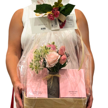 Load image into Gallery viewer, Elegant gift hamper featuring premium Peppermint Grove Australia products, including a large Austin &amp; Oud scented candle and full-size diffuser, beautifully paired with a delicate seasonal flower posy from Floral Atelier Australia. Perfect for sharing comfort, elegance, and lasting fragrance on special occasions.
