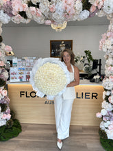 Load image into Gallery viewer, Play Bianca bouquet featuring 200 premium white roses arranged in a large rounded design by Floral Atelier Australia, Adelaide florist
