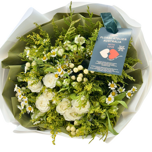 This classic rounded bouquet is designed to exude softness and natural beauty, bringing a sense of calm, freshness, and connection to nature—offering a glimpse of green meadows, forests, gardens, and riverbanks. The Pretty White Bouquet embodies a pure and effortless charm, free from artificial color contrasts, celebrating the simplicity and grace of seasonal blooms.