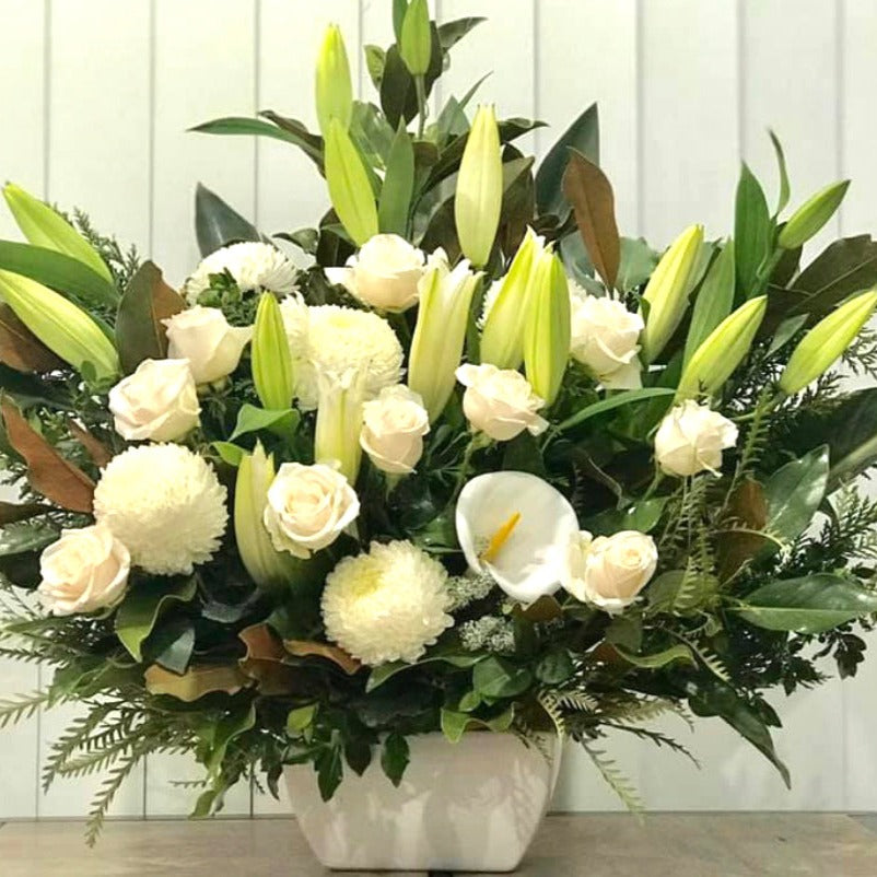 White-large-roses-cala-lilies-chrysantemums-for-funeral