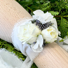 Load image into Gallery viewer, Handcrafted Pure Bliss Adelaide&#39;s White Corsage by Floral Atelier Australia, featuring elegant silk spray roses and white botanicals, secured with a long white chiffon ribbon.
