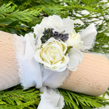 Load image into Gallery viewer, Detailed view of the Blue Mirage Adelaide&#39;s Dream Corsage showcasing the blend of silk spray roses and dried botanicals, perfect for complementing a blue dress at a formal event.
