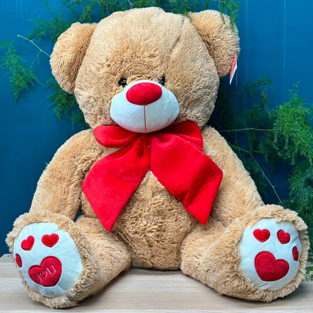 Experience the grandeur of love with Floral Atelier Australia's Teddy Bear Deluxe, featuring a plush brown fur and an endearing 'I love you' expression, standing at 90 cm to make a grand statement of affection, available for delivery in Adelaide