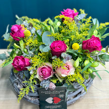 Load image into Gallery viewer, A vibrant rose arrangement featuring 2 pink roses, 5 hot pink roses, 5 alstroemerias, 2 yellow billy buttons, and lush greenery of golden rod and blue gum. The standard size offers a balanced display of bright colors, perfect for adding a lively and cheerful touch to any setting.
