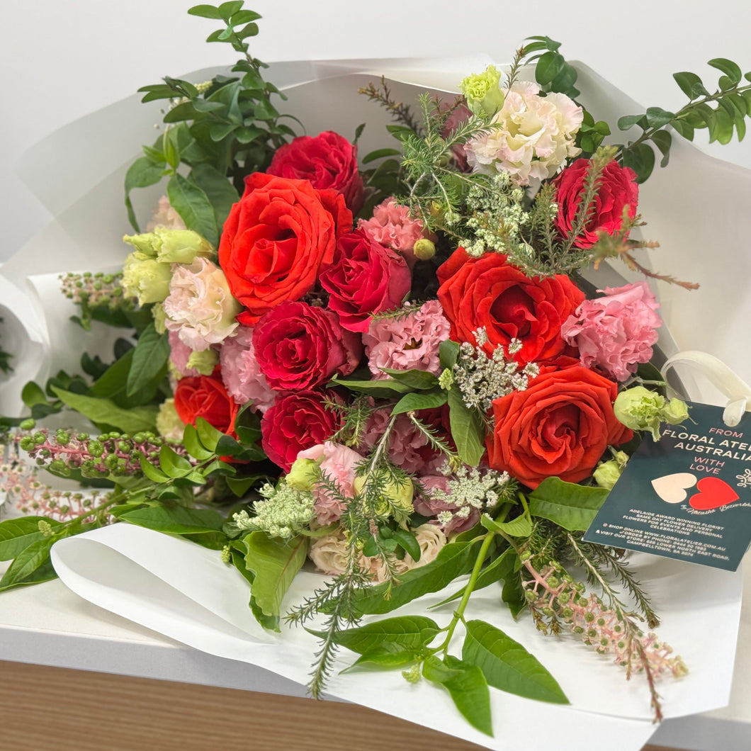 The Vivat Victoria Bouquet Deluxe by Floral Atelier Australia exudes luxury with a lavish arrangement of Ferrari Red roses and exquisite blooms, symbolizing deep love, masterfully crafted for Adelaide's discerning patrons, with same day flower delivery available