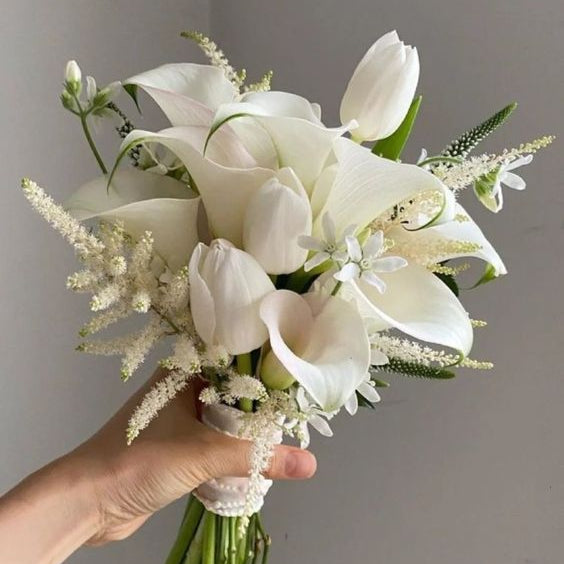 White Calla Lily and White Tulip Bridal Bouquet by Floral Atelier Australia, Adelaide wedding florist. A modern, minimal arrangement in elegant white tones.