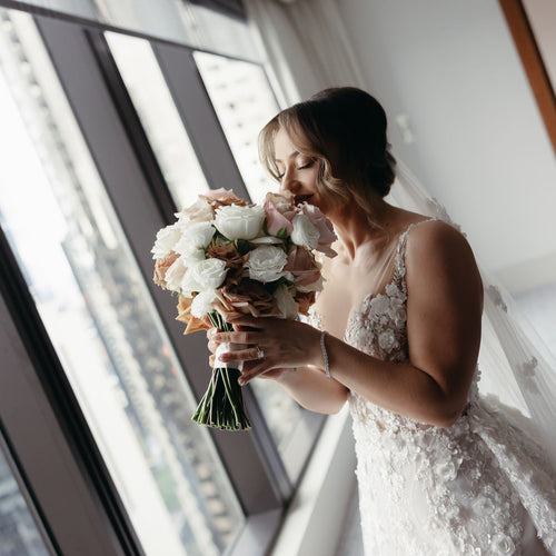 White, Toffee & Pink Ecuador Rose with Lisianthus Bridal Bouquet by Floral Atelier Australia – hand-tied design with reflexed Ecuador roses and seasonal white lisianthus in a soft, sculptural form.