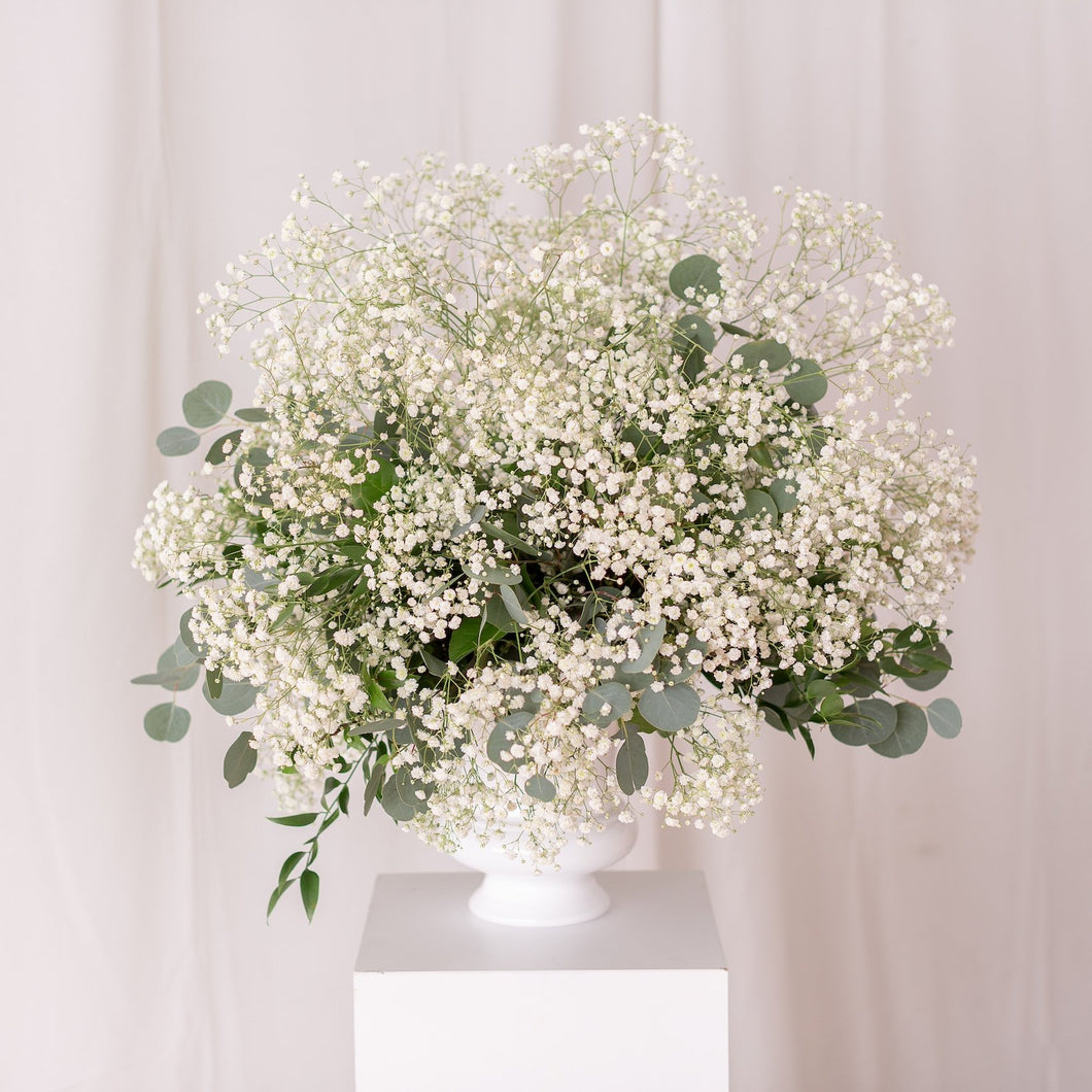 Baby’s breath wedding centerpiece styled in a white urn for ceremony altar – Floral Atelier Australia, Adelaide wedding florist.
