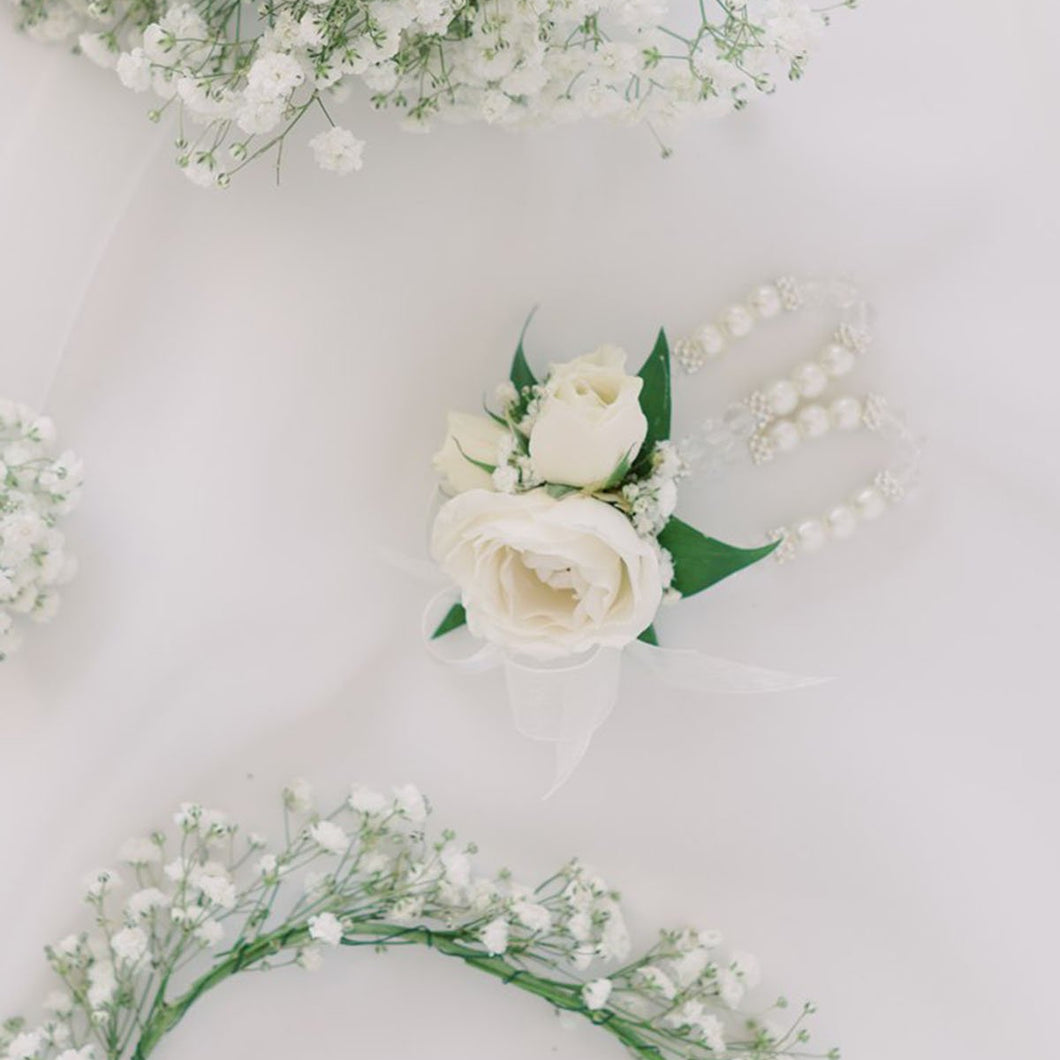 White rose and baby’s breath wrist corsage with pearl bracelet – Floral Atelier Australia, Adelaide wedding florist.