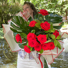 Load image into Gallery viewer, Monstera Leaves Dozen Ferrari Red Roses
